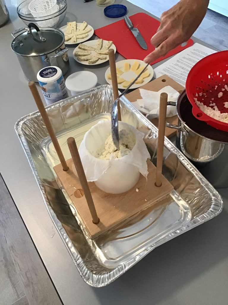 scoop the curds into a form lined with cheesecloth