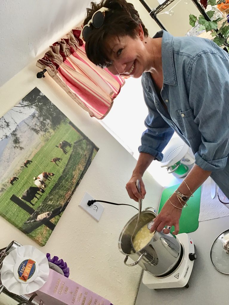 My cheesemaking partner Suzanne, keeping the curds at the correct temperature